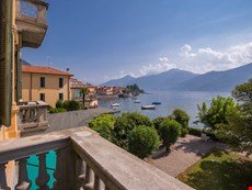 Photo of Menaggio Apartment with views of Lake Como and mountainside, steps from ferry, boutique shops, restaurants, outdoor sports activities.